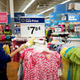 FILE PHOTO: An employee cleans a clothes rack at the Walmart Supercenter in Bentonville, Arkansas, U.S., June 5, 2014. REUTERS/Rick Wilking/File Photo GLOBAL BUSINESS WEEK AHEAD SEARCH GLOBAL BUSINESS 13 NOV FOR ALL IMAGES - RC11ED7FA960